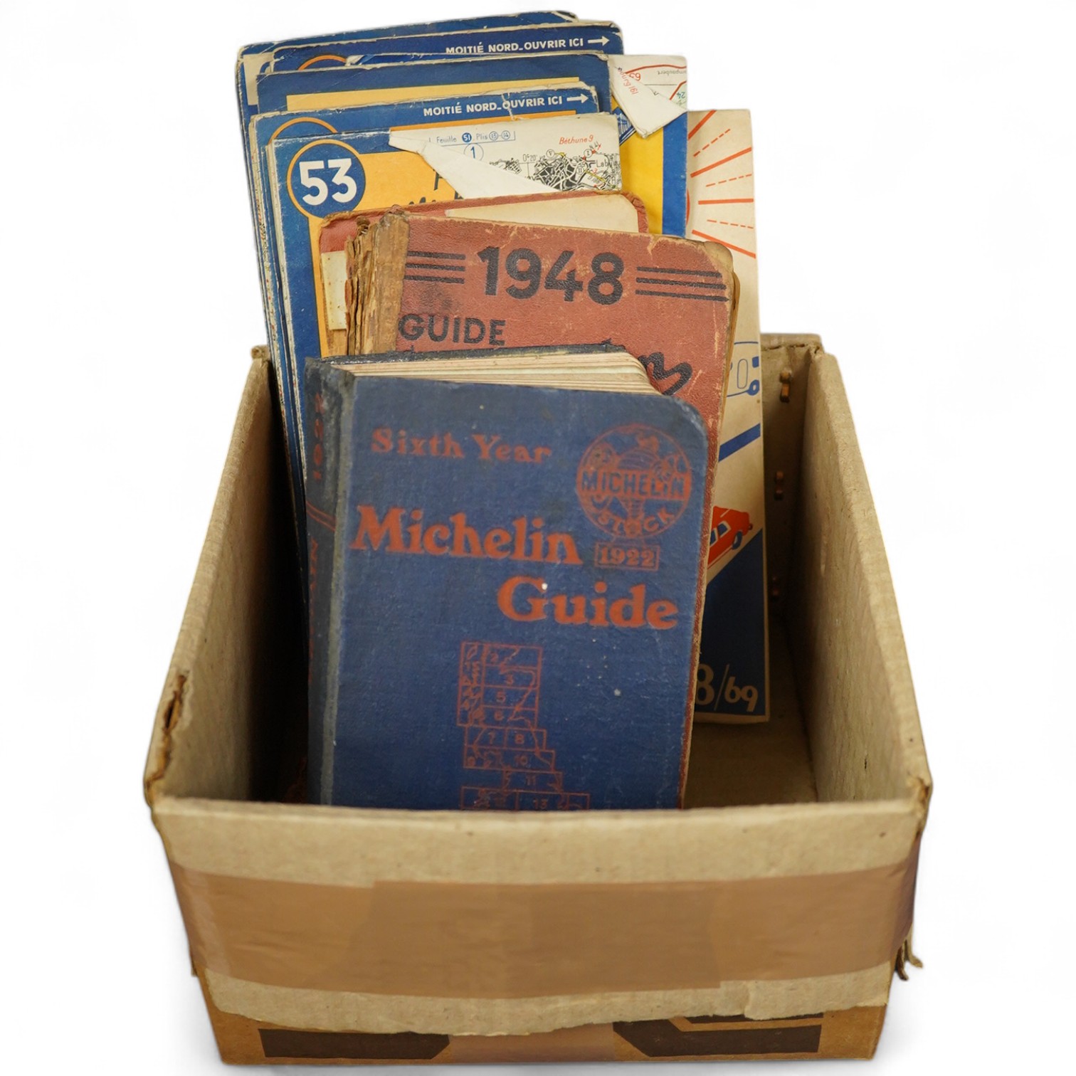 Two Michelin Guides, 1922 and 1948, together with six continental maps of France and Italy. Condition - fair to good.